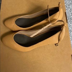 Low heel ankle strap pumps